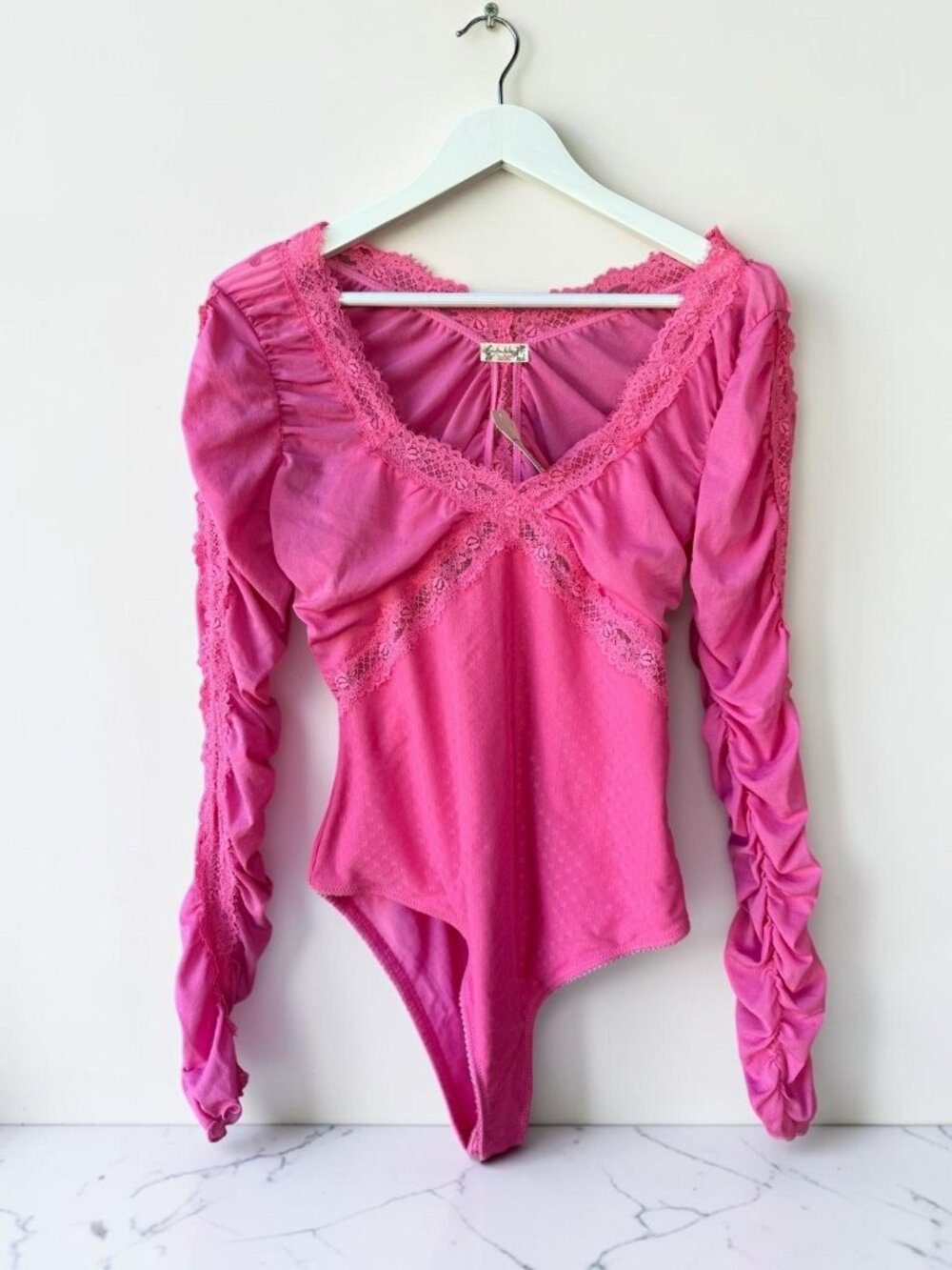 Free People Intimately Pink Wink Bodysuit M NWT Lace Ruched Long Sleeve